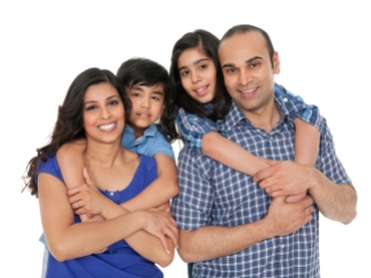 Indian family portrait. Happy parents piggybacking their children over white background. Horizontal Shot.